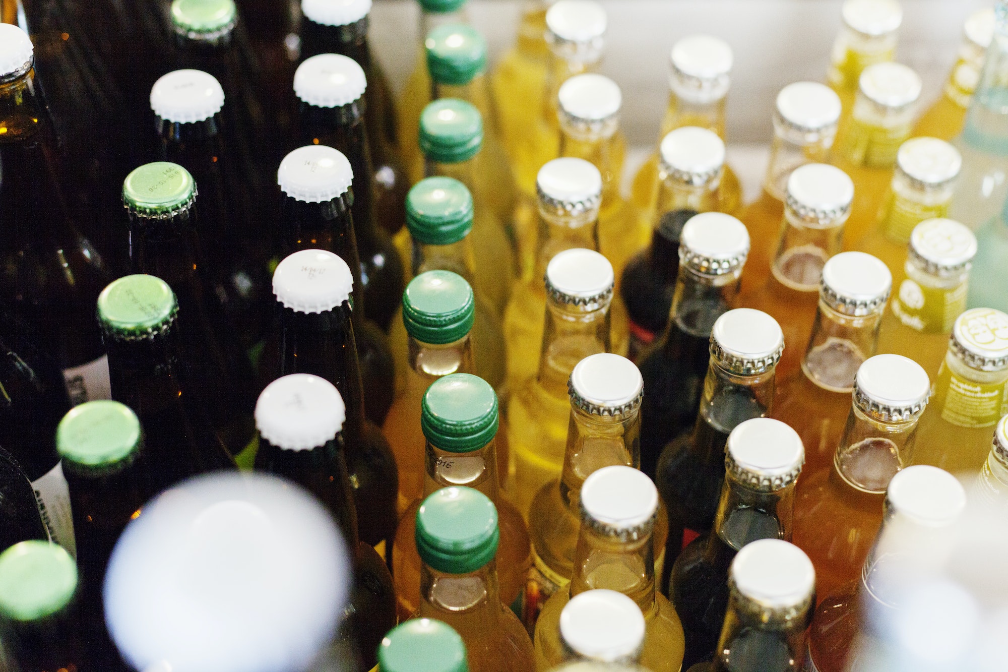 High angle view of cold drink bottles at restaurant